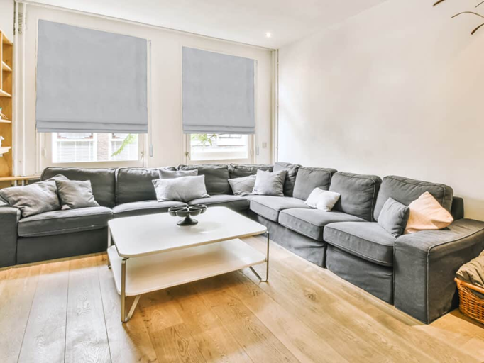 Adding Ambiance To Living And Dining Areas With Fabric Roman Shades